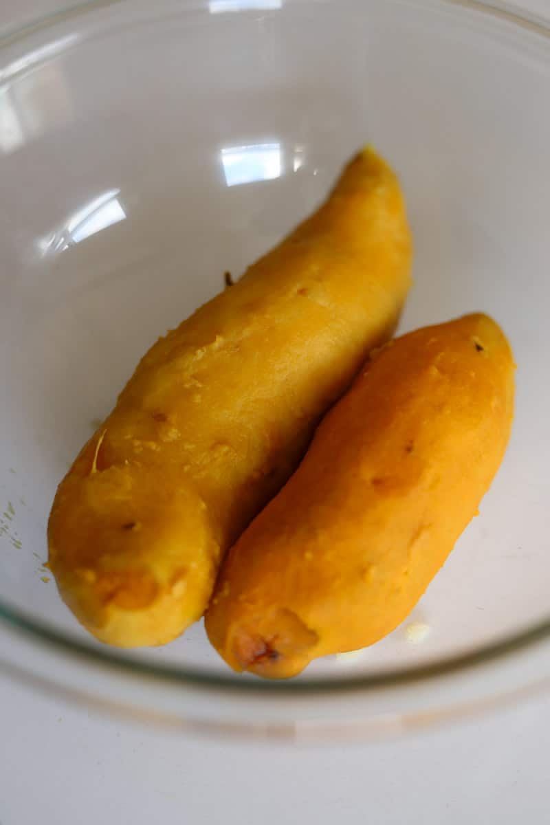 peeled sweet potatoes in a clear bowl