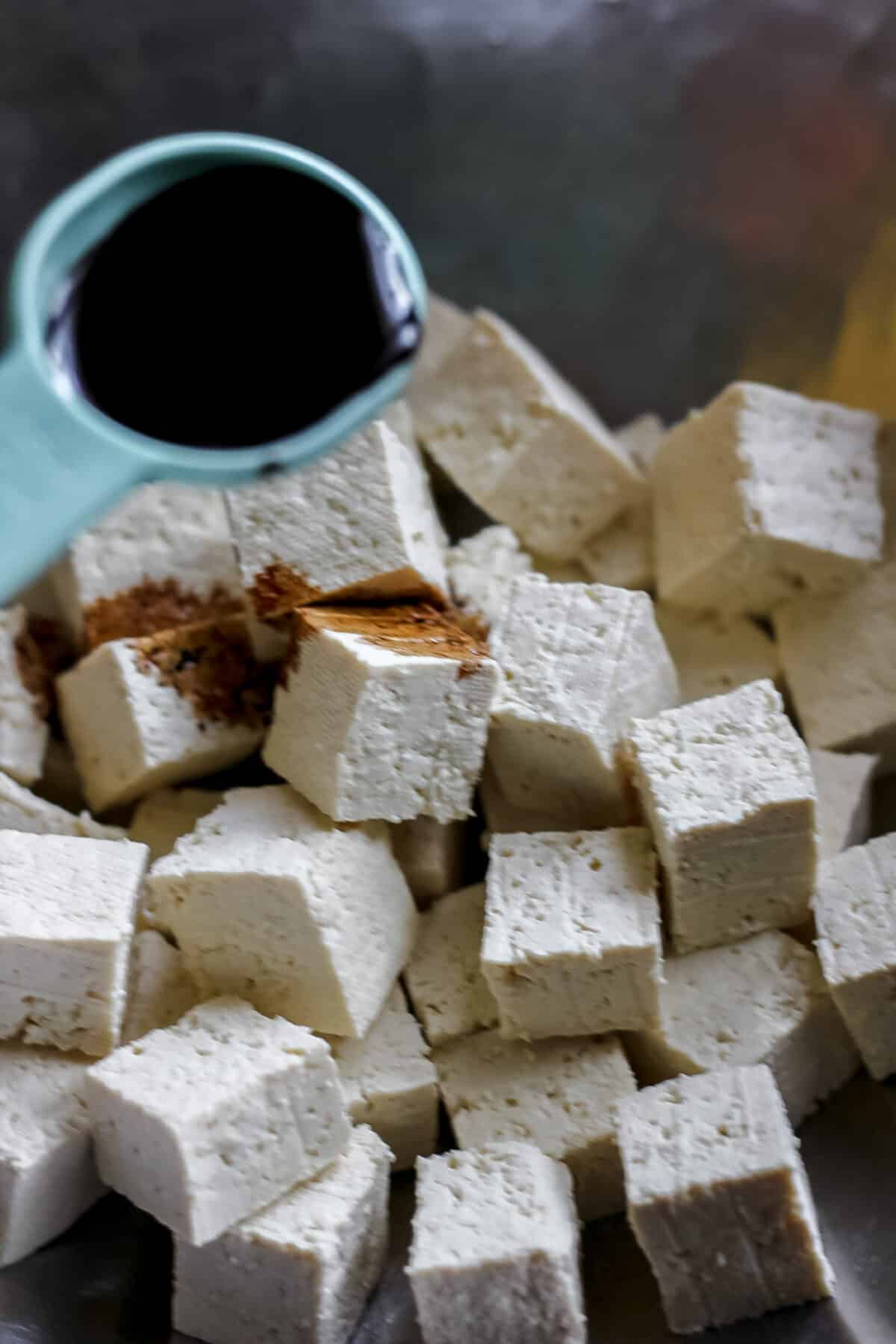 diced tofu on a cutting board