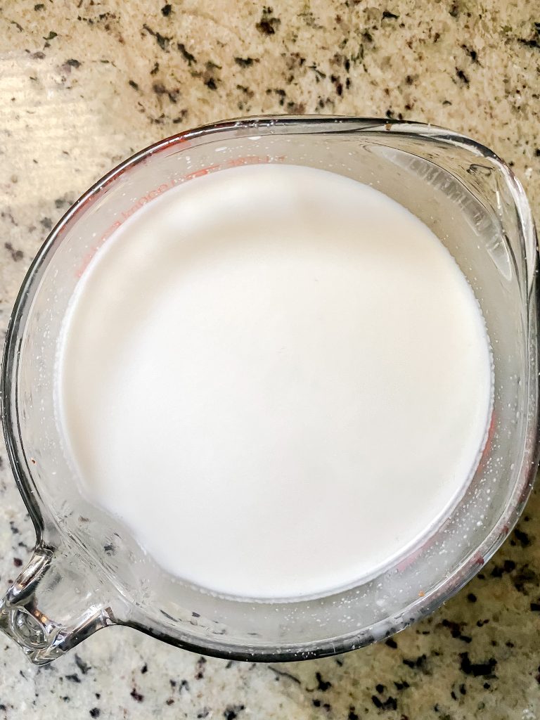 Fresh Almond Milk in Measuring Cup