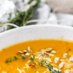 Creamy Instant Pot Butternut Squash Soup Overhead Shot w/ half bowl close up