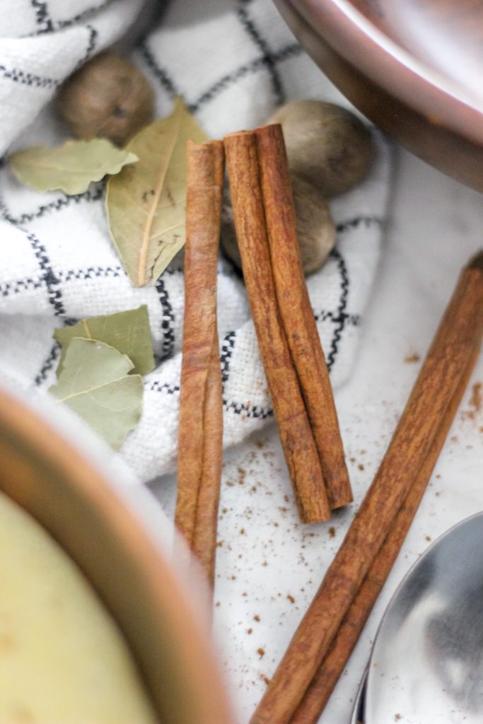 Cinnamon Sticks and Bay Leaves on Black and White Tea Towel