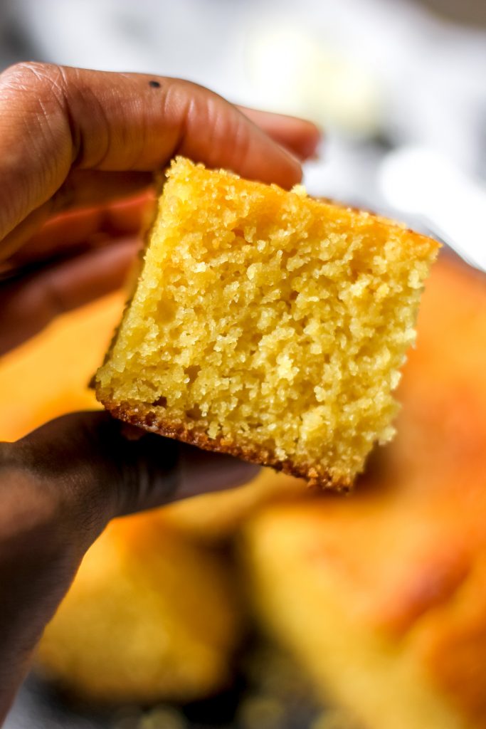 Easy Classic Buttermilk Cornbread slice in hand