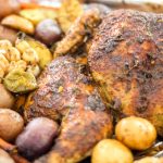 Roasted Herb and Garlic Butter Spatchcock Chickenith potatoes around