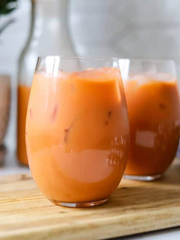 jamaican carrot juice poured into two glasses.