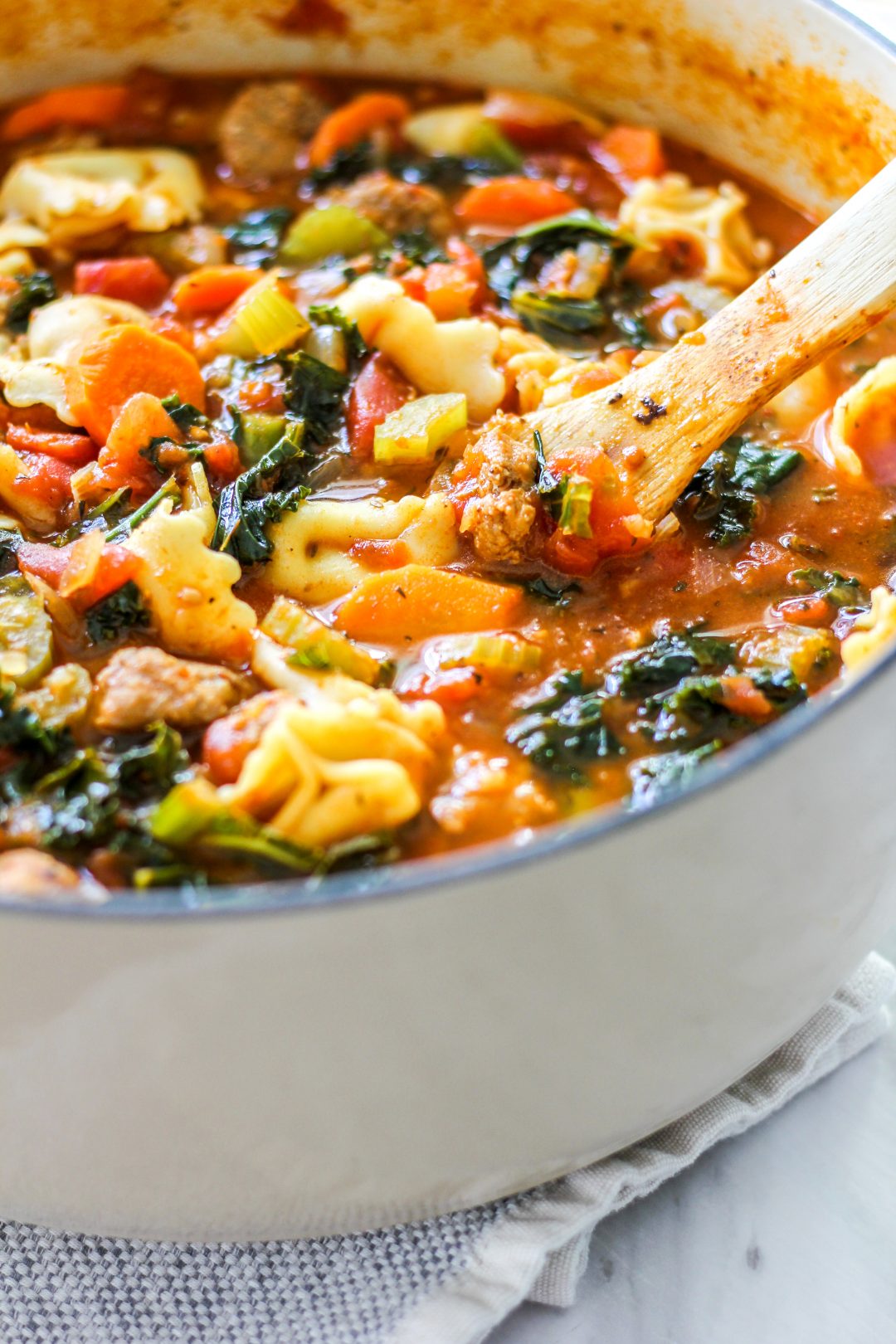 Healthy Hearty Italian Sausage Tortellini Soup - The Seasoned Skillet
