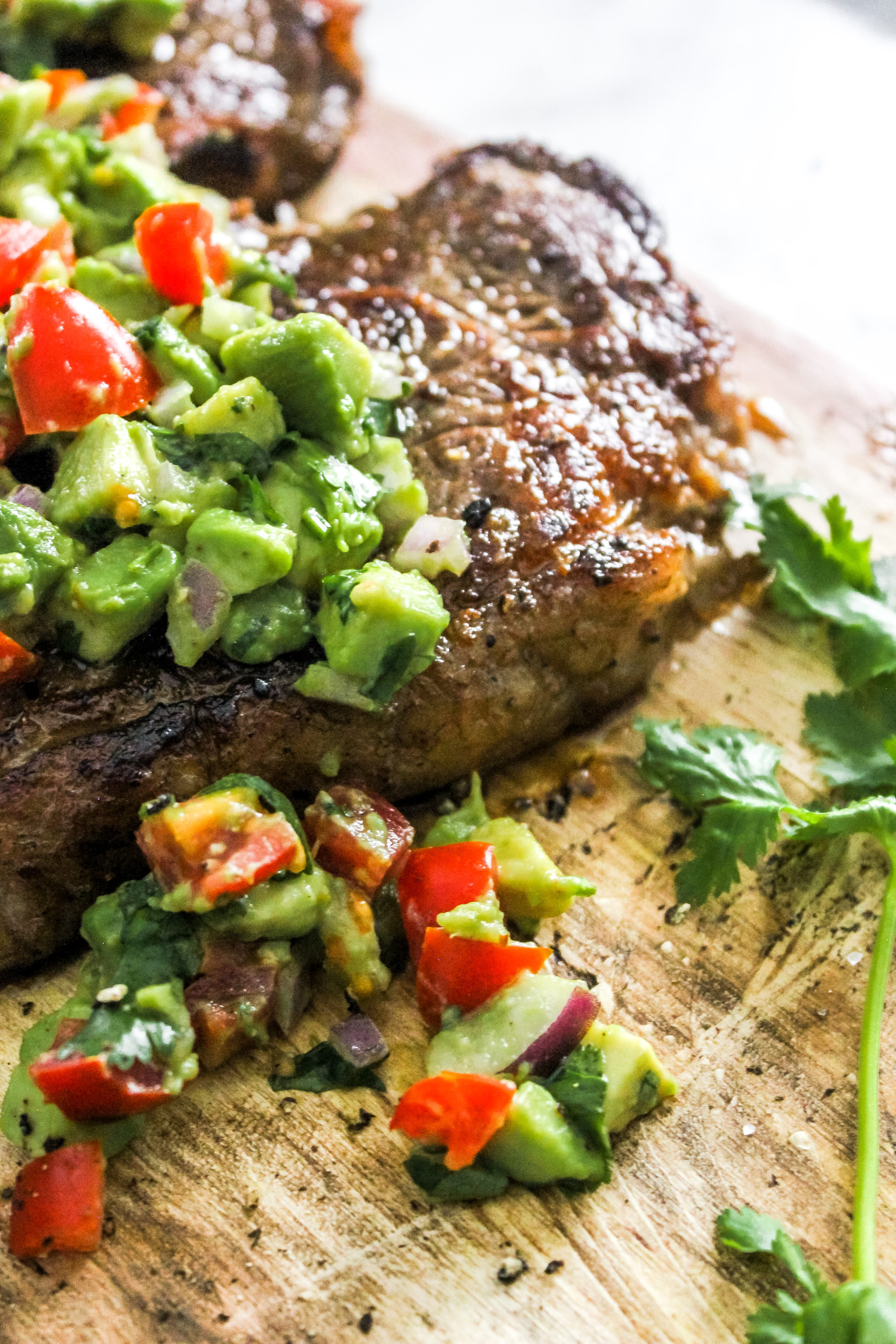 Pan Seared Steak with Chunky Tomato Avocado Salsa - The Seasoned Skillet