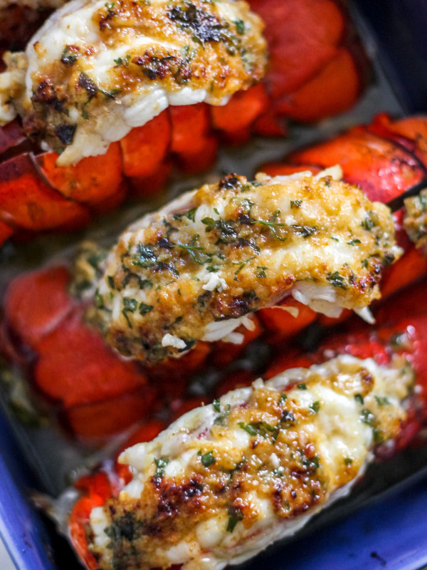 White Wine Garlic Butter Lobster Tails in Blue Dish