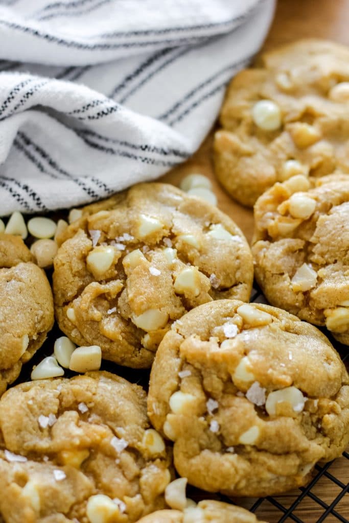 Flatlay of Brown Butter White Chocolate Macadamia Nut Cookies