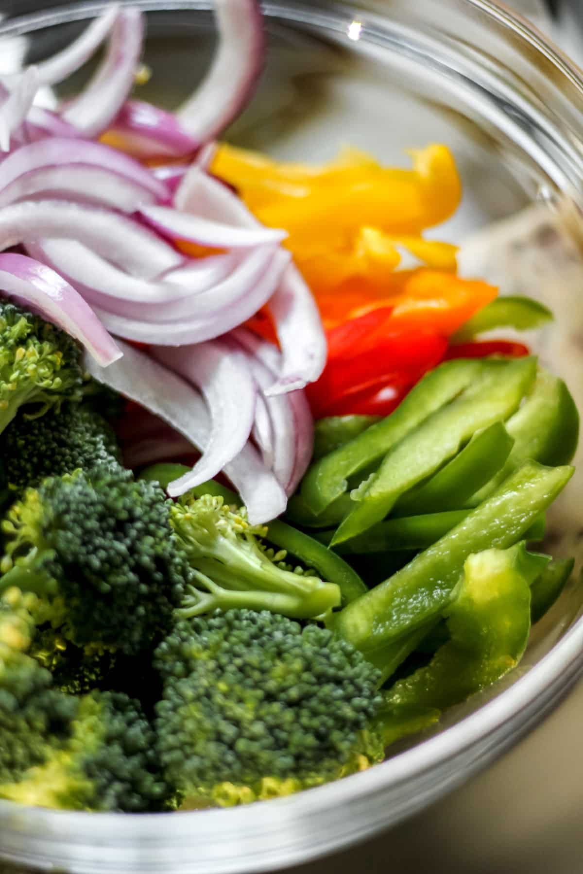 broccoli, bell peppers, and red onion