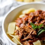 Slow Cooked Beef Ragu with Pappardelle in grey speckled bowl