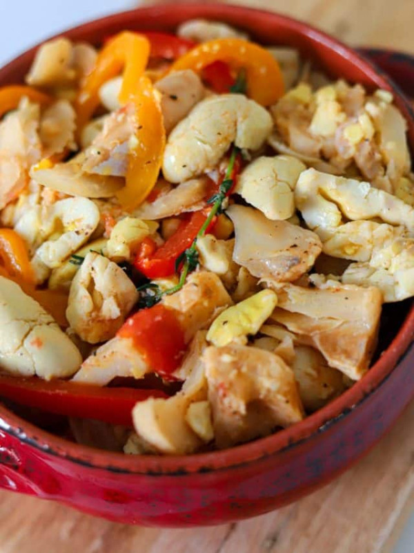 a bowl full of ackee and saltfish.