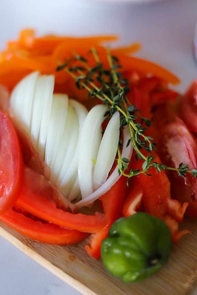 sliced onion, peppers and thyme for saute