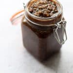 Jamaican jerk marinade stored in a glass bottle