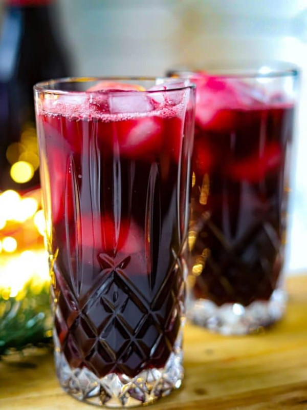 jamaican sorrel drink in two glasses with ice.