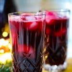 jamaican sorrel drink in two glasses with ice.