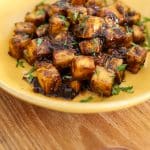 crispy baked jerk tofu in bowl.