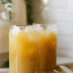 jamaican ginger beer in two glasses with ice.