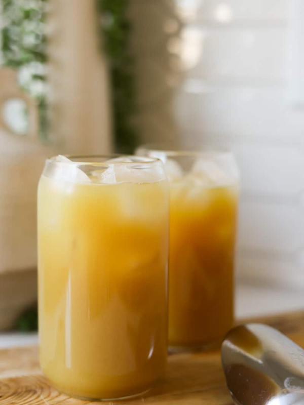 jamaican ginger beer in two glasses with ice.