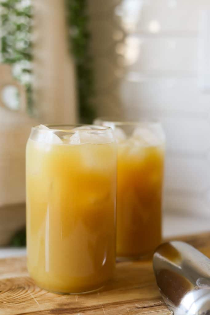 jamaican ginger beer in two glasses with ice.