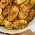 a plate of sliced fried plantains.