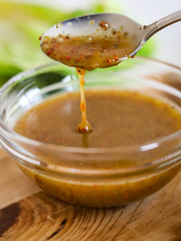 homemade honey mustard dressing in a bowl.