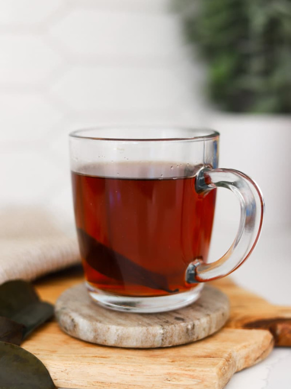soursop tea in glass mug.
