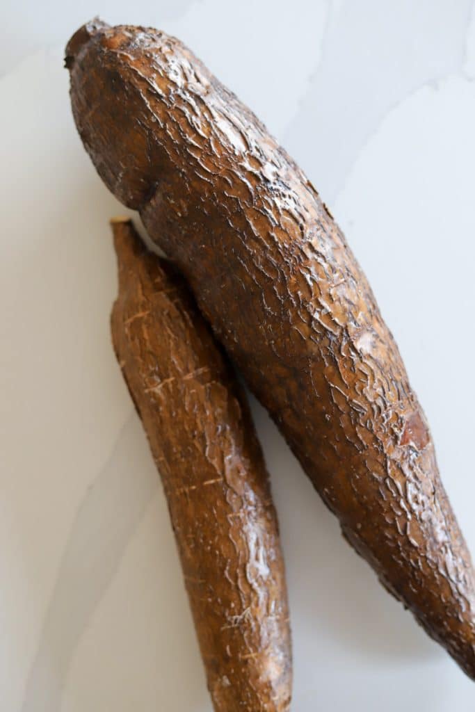 two whole cassava roots.
