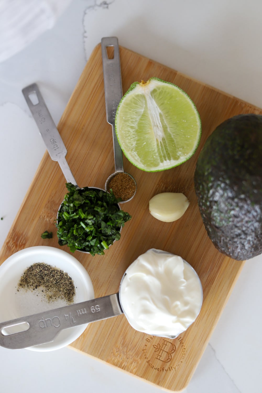 Fresh avocado crema ingredients for Jamaican jerk chicken tacos