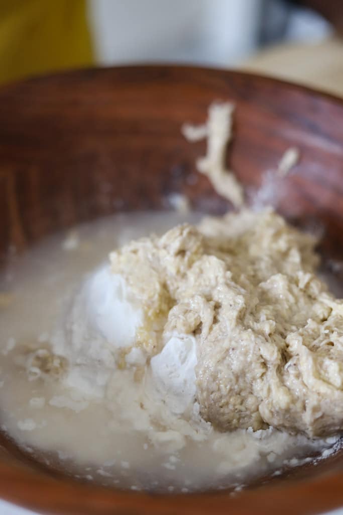 flour, water, and green banana pulp in bowl.