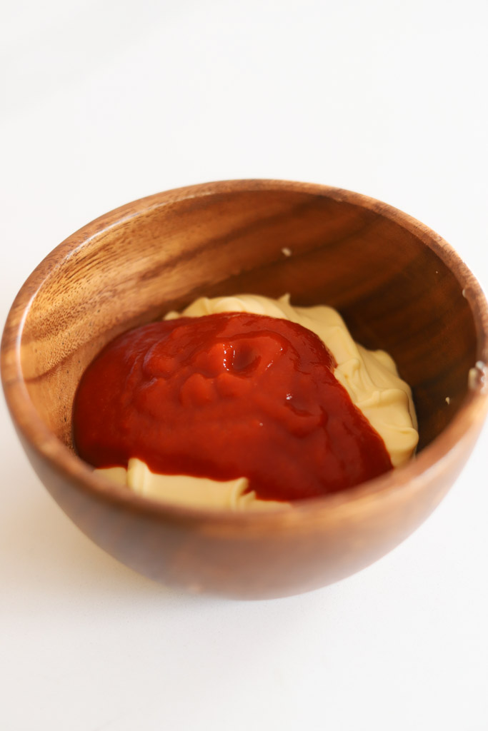 kewpie mayo and sriracha sauce combined in a bowl.