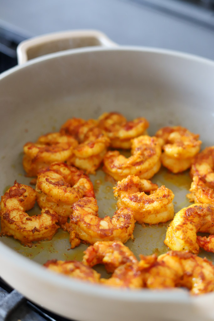 curry shrimp in skillet.