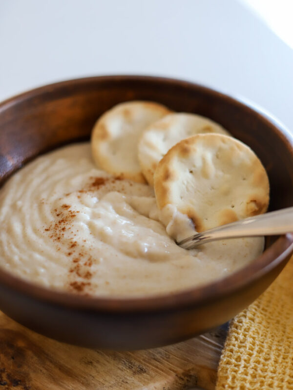 oats porridge in wooden bowl.