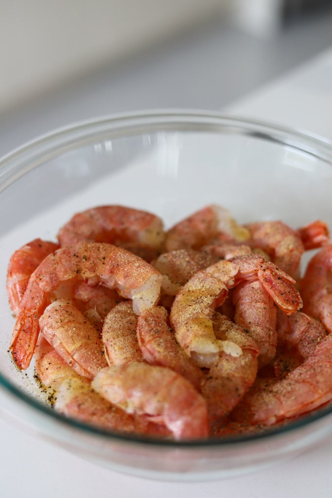 seasoned shrimp in a mixing bowl