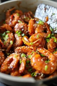 close up view of sweet chili shrimp in a pan