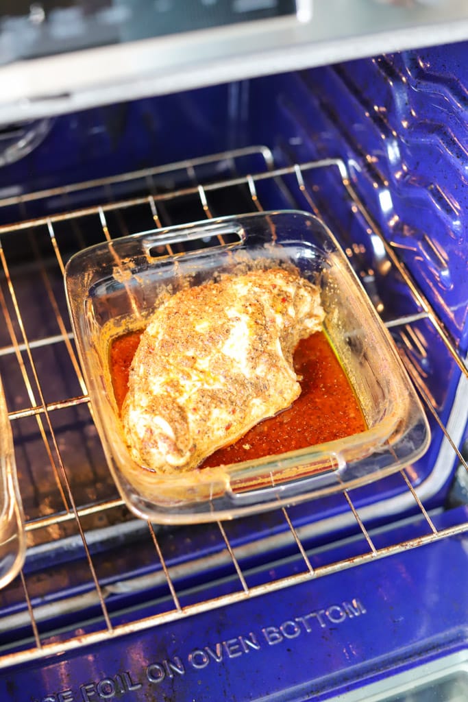 cajun butter turkey breast roasting in oven.