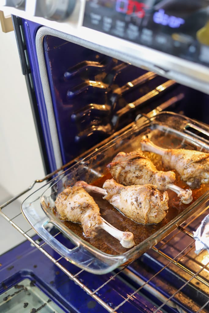 turkey drumsticks baking in oven.