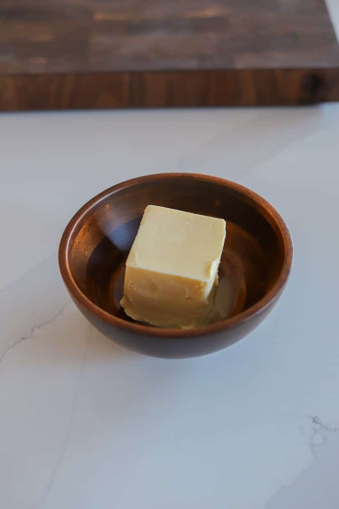 a small dish full of butter