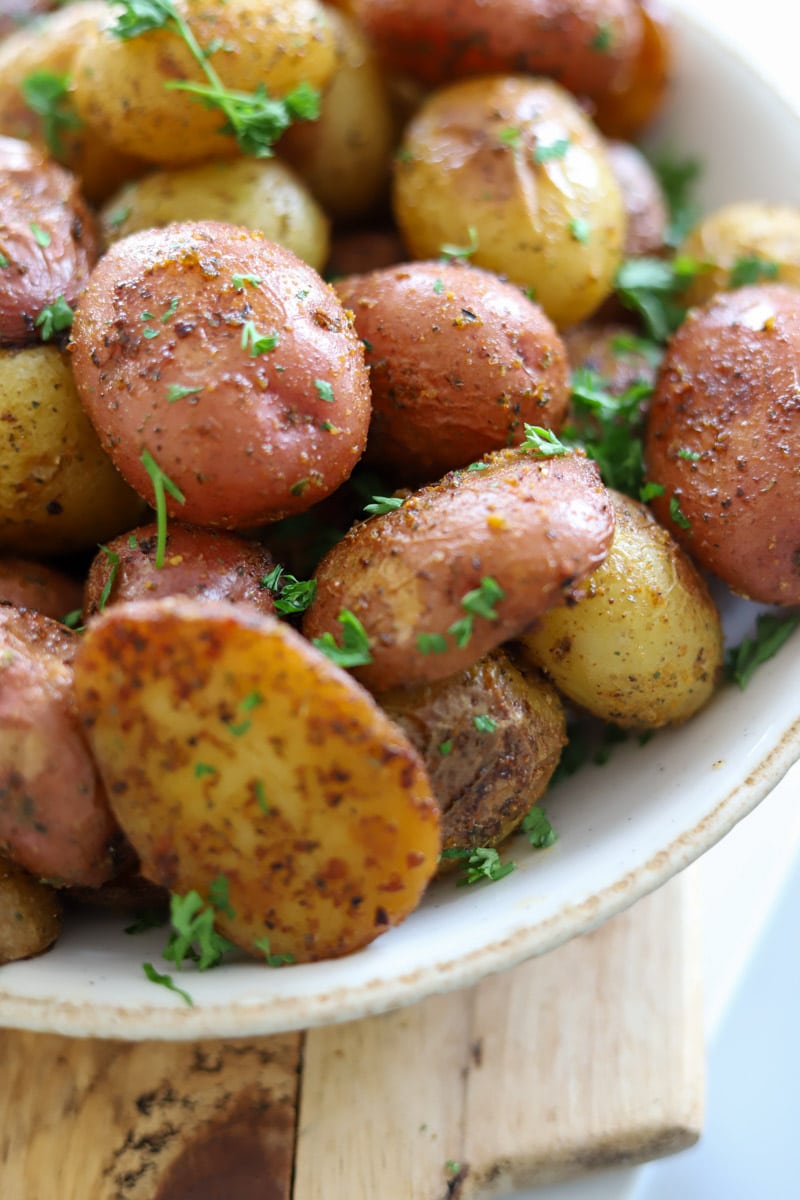 close up bowl of roasted baby potatoes