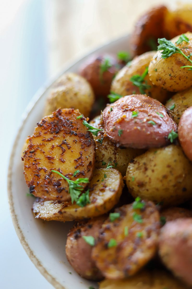 close up view of roasted baby potatoes in a bowl