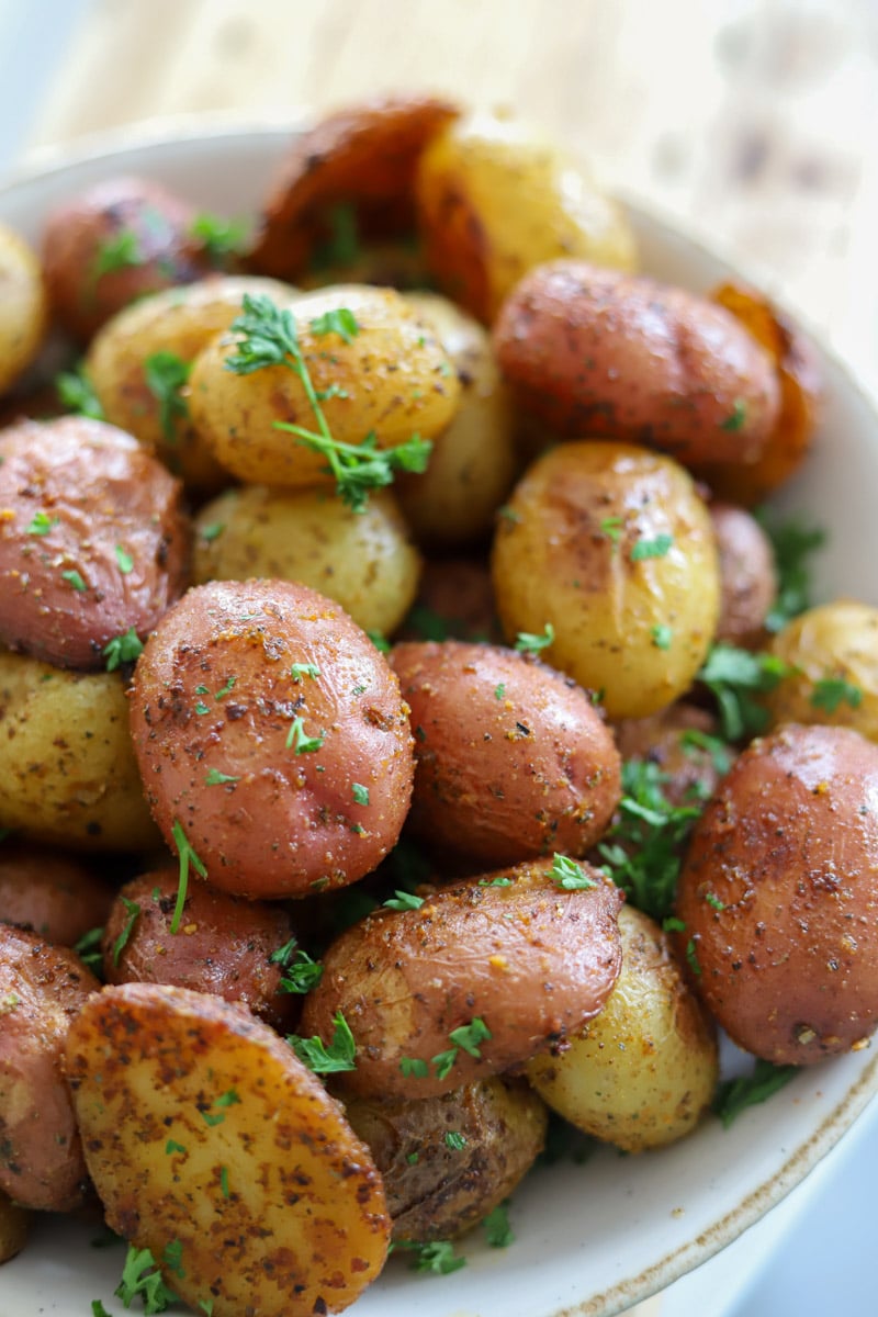 close up view of roasted baby potatoes in a bowl