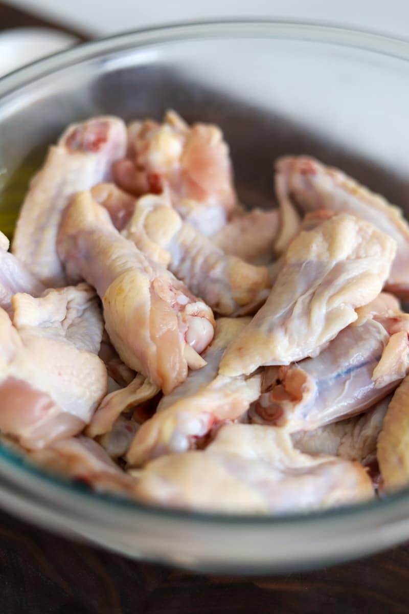 raw chicken wings in a bowl