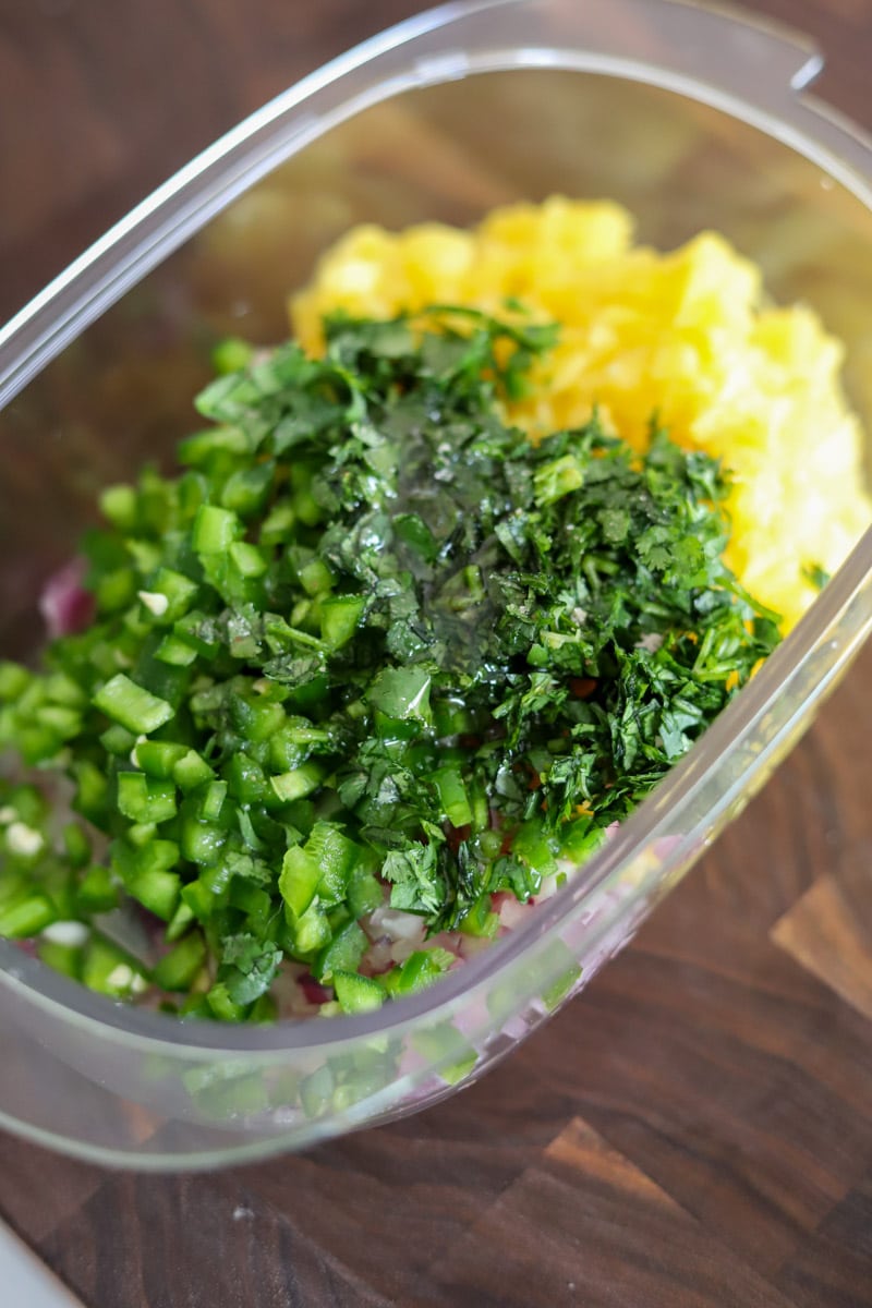 a container filled with ingredients that have yet to be mixed