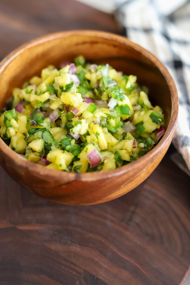 a bowl full of pineapple salsa