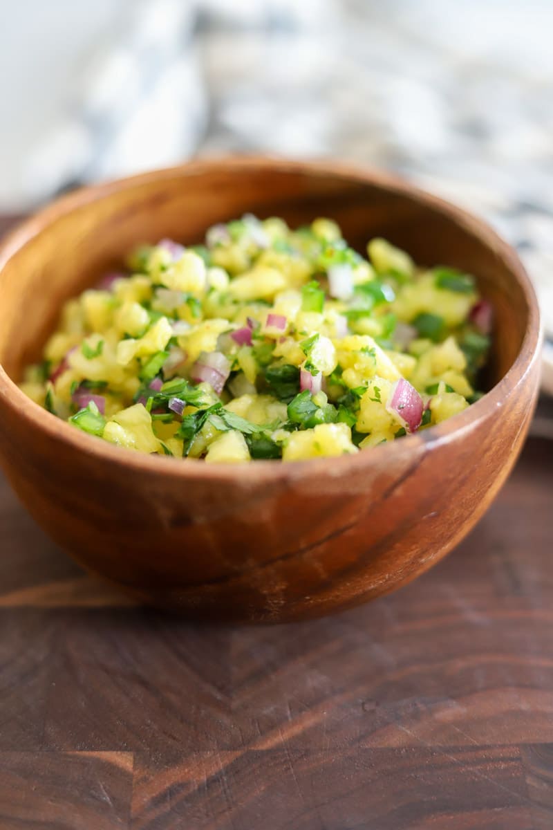 a bowl of pineapple salsa