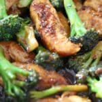close-up view of chicken and broccoli in a skillet
