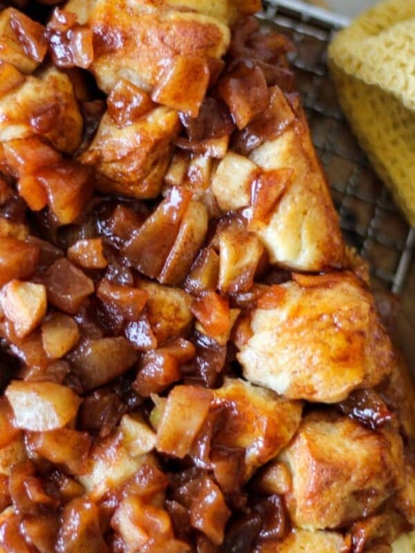 Overhead view of apple cinnamon monkey bread with glossy caramelized apple topping.