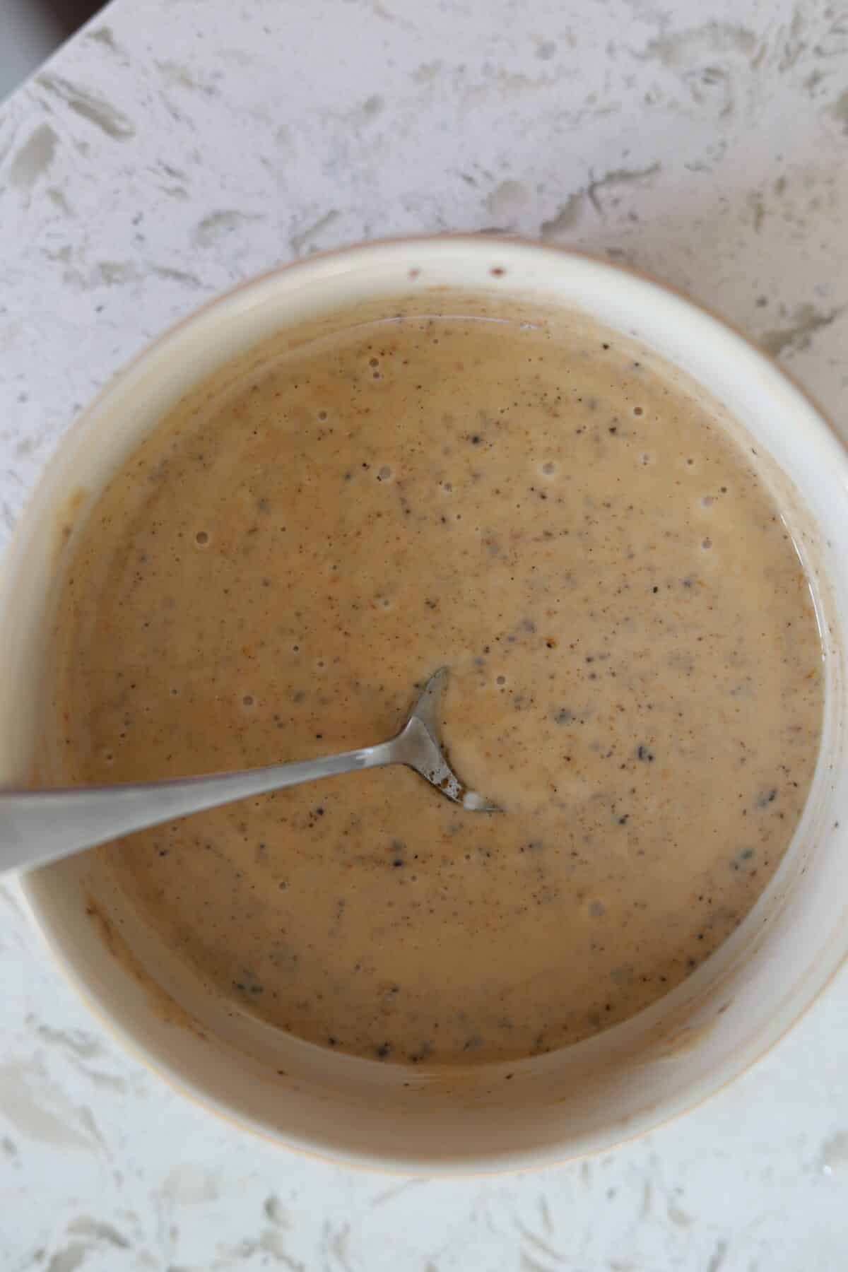 Bowl of jerk sauce after stirring.