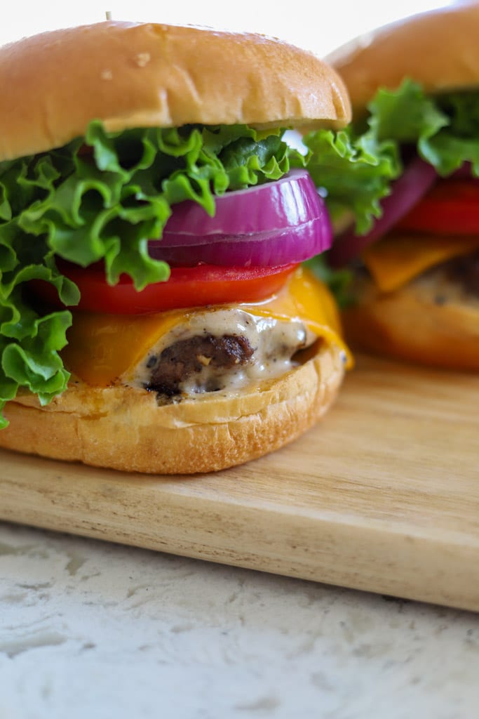 jerk burger on wooden board.