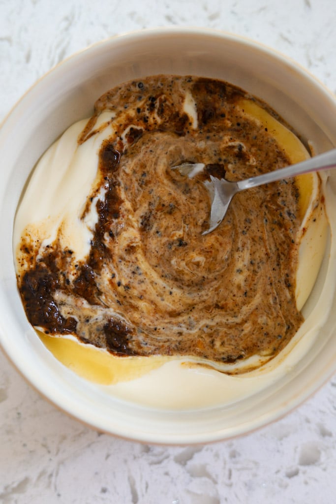 ingredients for honey jerk mayo mixed in bowl.